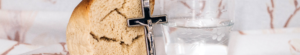 pain et eau avec crucifix